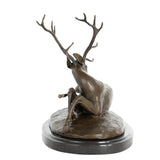 Back view of reclining bronze stag statue showing the resting pose and detailed bronze craftsmanship