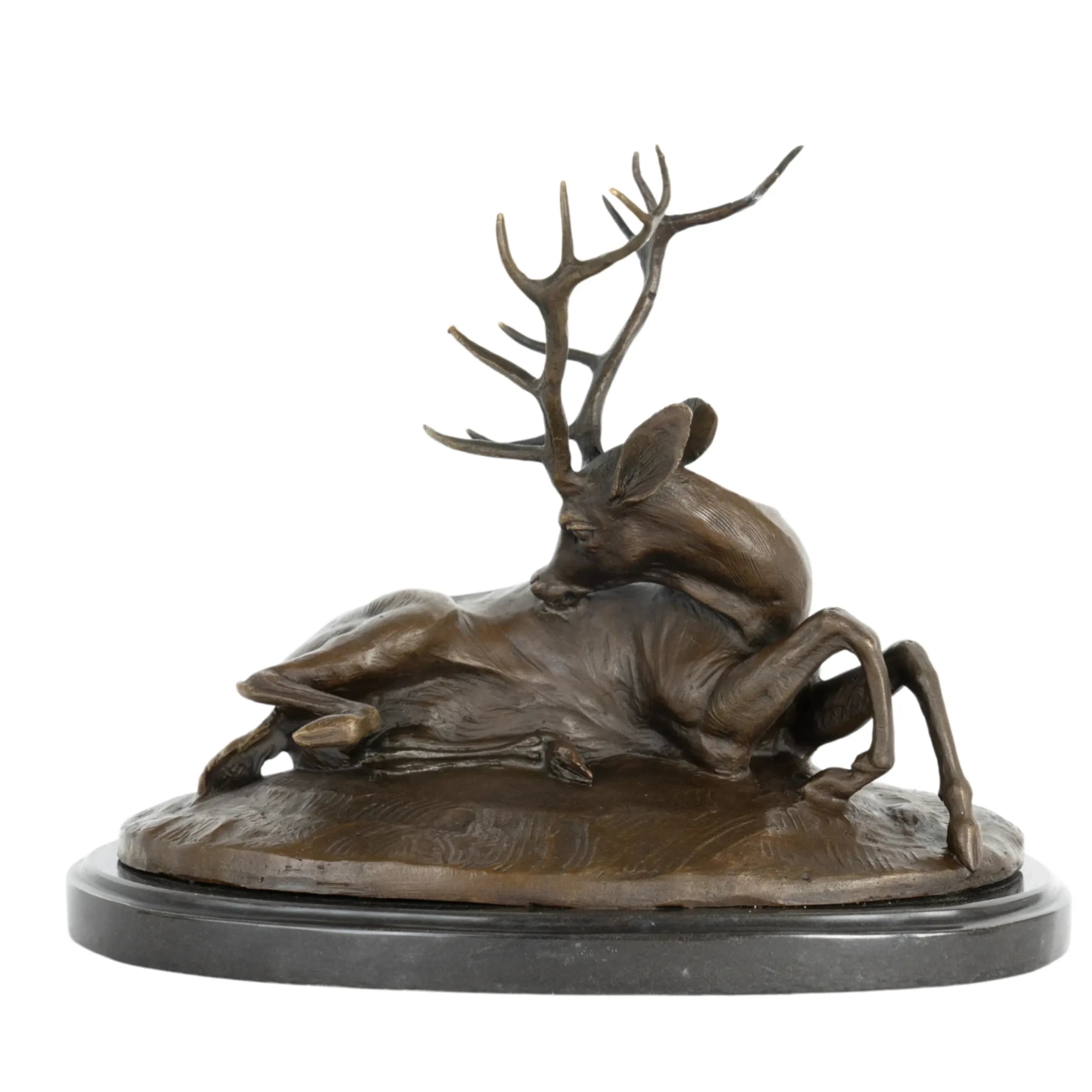 Left side view of reclining bronze deer sculpture featuring a resting stag turning its head