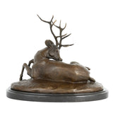 Right side view of handcrafted bronze resting stag statue with detailed antlers and natural body texture