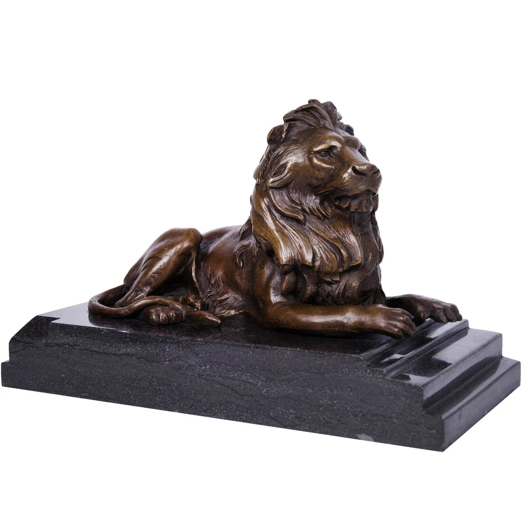 Handcrafted reclining bronze lion statue with raised head and detailed flowing mane