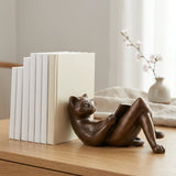 Left view of reclining reading cat bronze sculpture with book