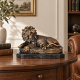 Bronze reclining male lion statue roaring with a powerful expression and warm hand-applied patina