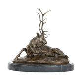 Right side view of reclining stag bronze sculpture with tall antlers