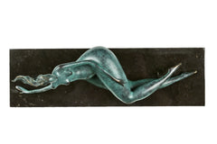 Top view of abstract reclining woman bronze sculpture on its rectangular base