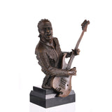 Handcrafted rock guitarist bronze bust sculpture with electric guitar on black marble base.
