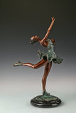 Right side view of bronze roller skater statue in an elegant balancing pose