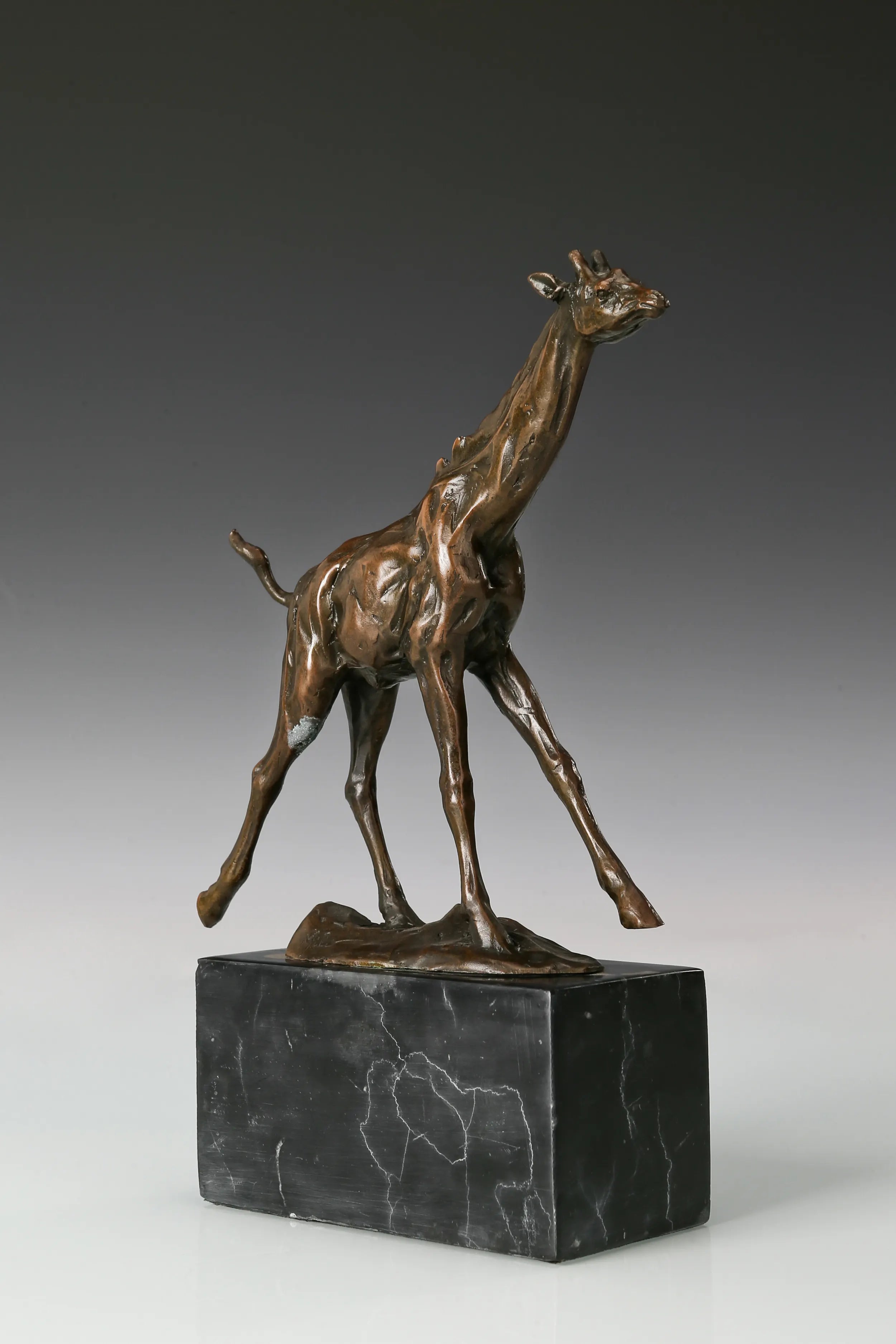 Running Giraffe bronze sculpture three-quarter view