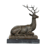 Right side view of handcrafted bronze deer statue in a graceful resting pose