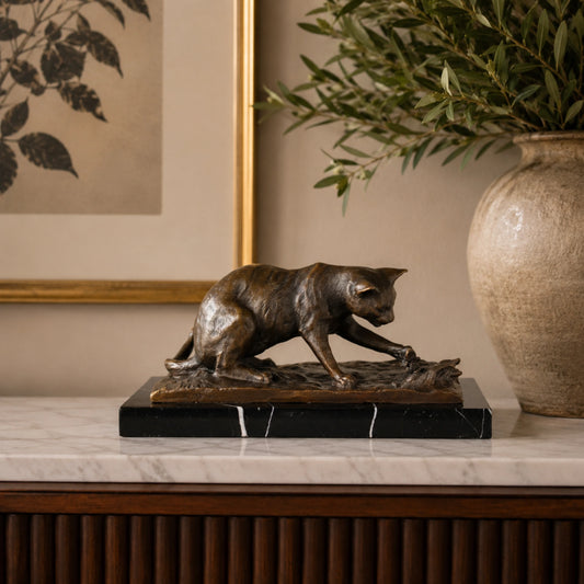 Stalking Panther Bronze Sculpture displayed in a styled interior