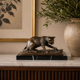 Stalking Panther Bronze Sculpture displayed in a styled interior