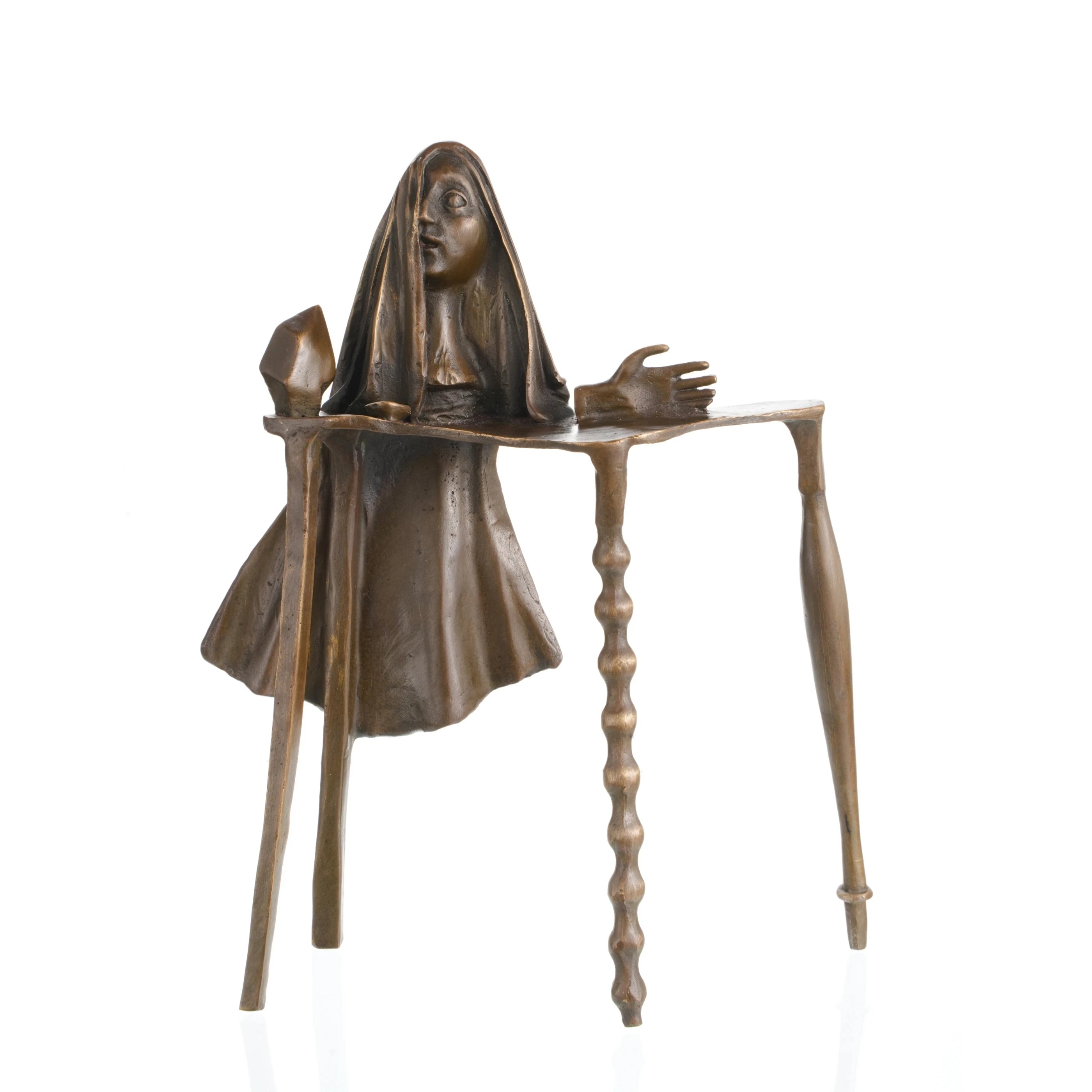 Surrealist bronze sculpture of female figure emerging from abstract table