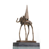 this bronze elephant on stilts sculpture features elongated legs and an obelisk motif. A striking surrealist art piece for collectors and modern interiors.