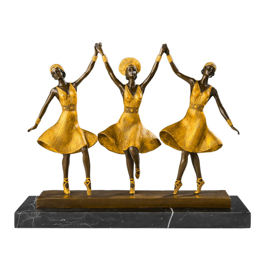 Front view of three ballerinas bronze sculpture with joined hands and golden dresses