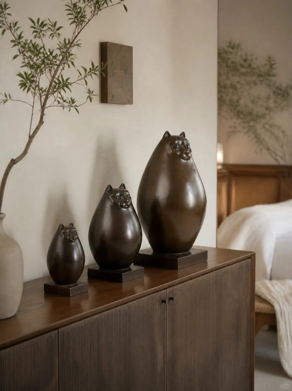 Toperkin bronze cat sculpture displayed in a customer’s office