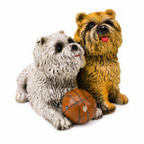 Two bronze playful puppies sitting together with a ball in a charming decorative dog sculpture