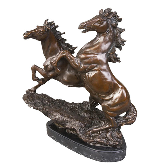 Dynamic bronze statue of two rearing horses with lifelike detail. A powerful symbol of unity, ambition, and unstoppable energy.