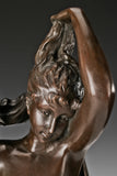 Close-up of Venus bronze sculpture showing facial features hair and classical craftsmanship