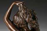 Close-up of Venus bronze sculpture showing facial features hair and classical craftsmanship