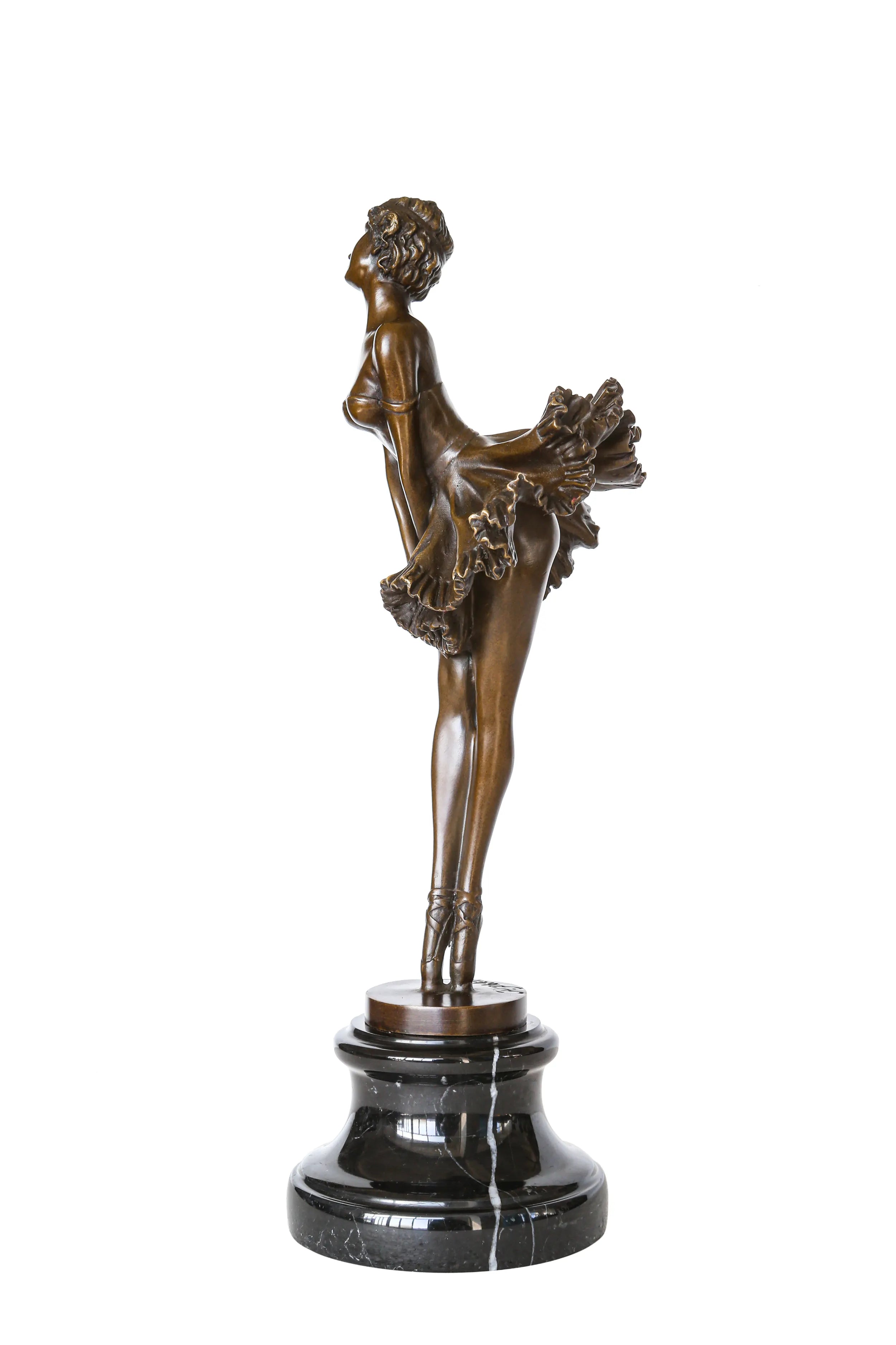 Left side view of vintage ballerina bronze statue showing the sculpted tutu