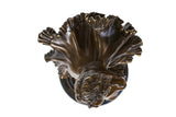 Detailed flared bronze ballet tutu with flowing folds and textured edges