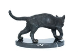 Back view of handcrafted walking cat bronze sculpture with raised tail