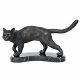 Left side view of walking cat bronze statue on marble base