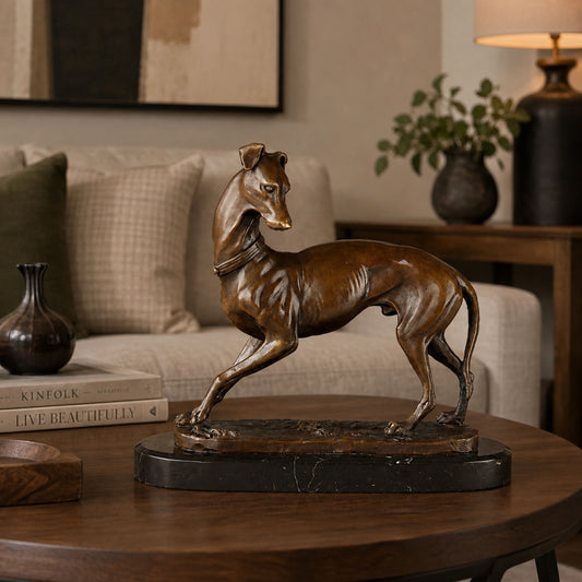 walking greyhound bronze sculpture displayed in a styled interior