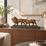 Walking Lion Couple Bronze Statue displayed in a minimalist interior