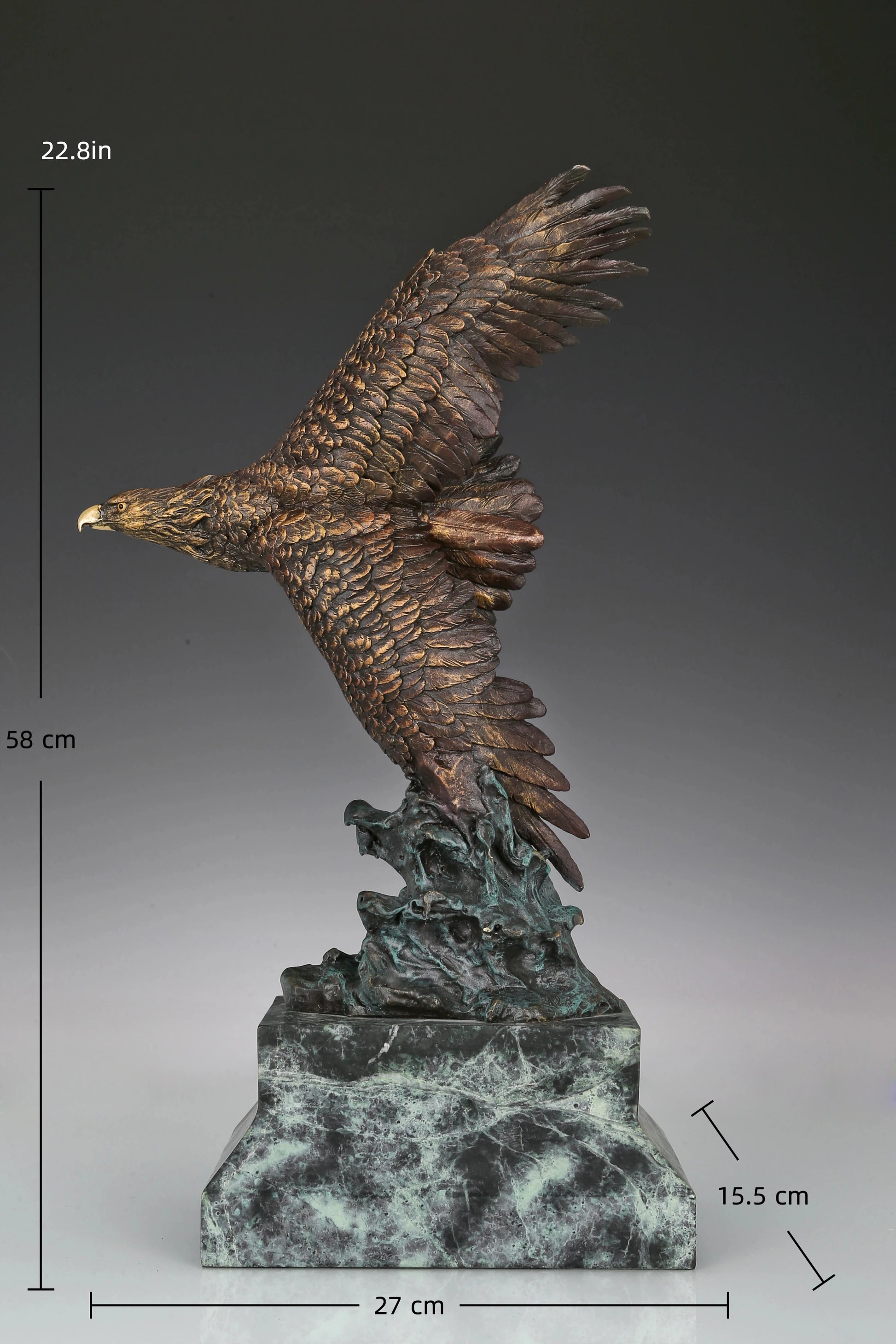 Bronze eagle sculpture with wings spread, capturing a powerful takeoff moment. A bold statue symbolizing strength, freedom, and ambition.
