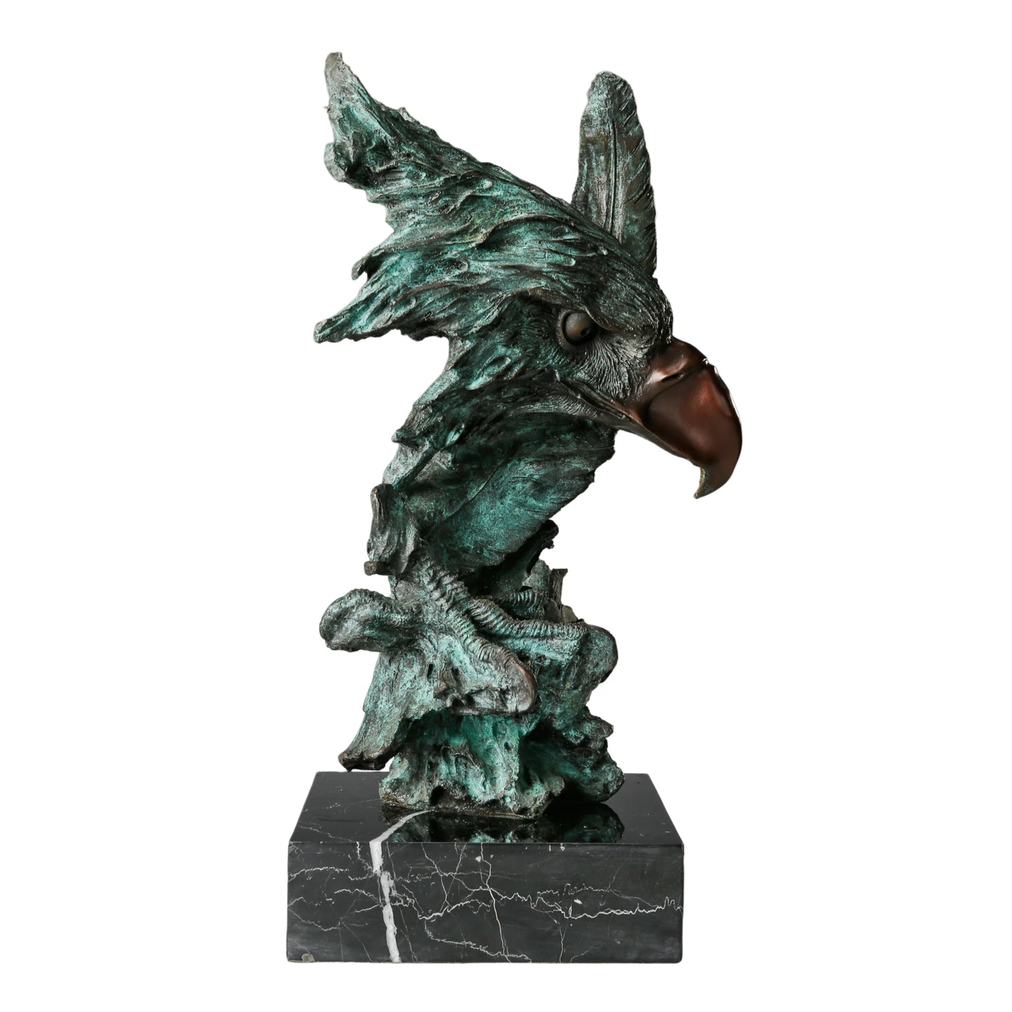 bronze eagle head sculpture with striking verdigris patina and marble base. A bold wildlife statue symbolizing freedom, strength, and vision.