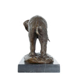 This realistic bronze sculpture portrays the majestic presence of an African elephant, carefully crafted using the traditional lost-wax casting technique. 