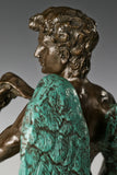 Close-up detail of handcrafted bronze male figure sculpture